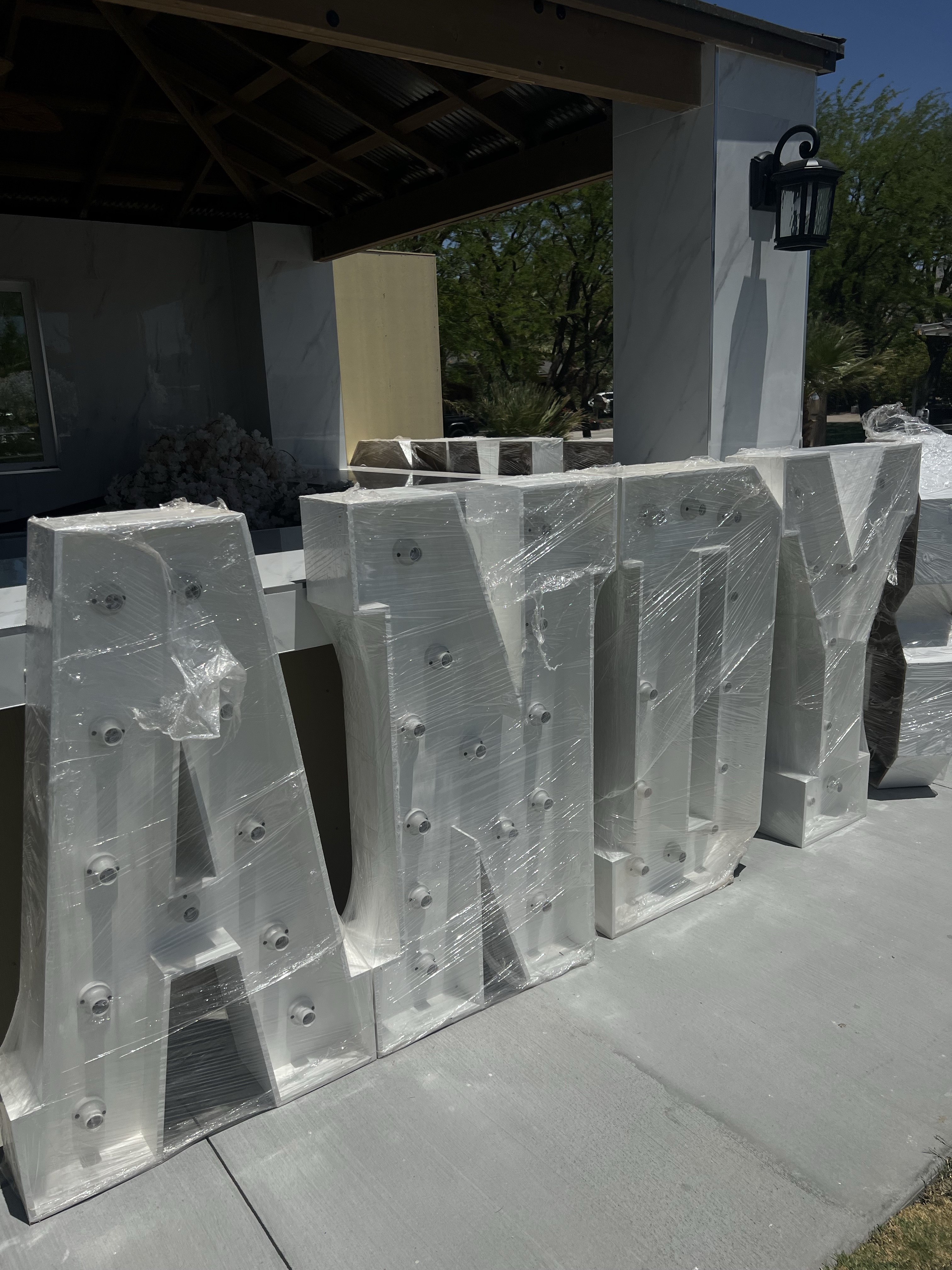 Large light-up marquee letters wrapped and ready for delivery